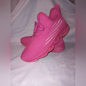 Hot pink tennis shoes.